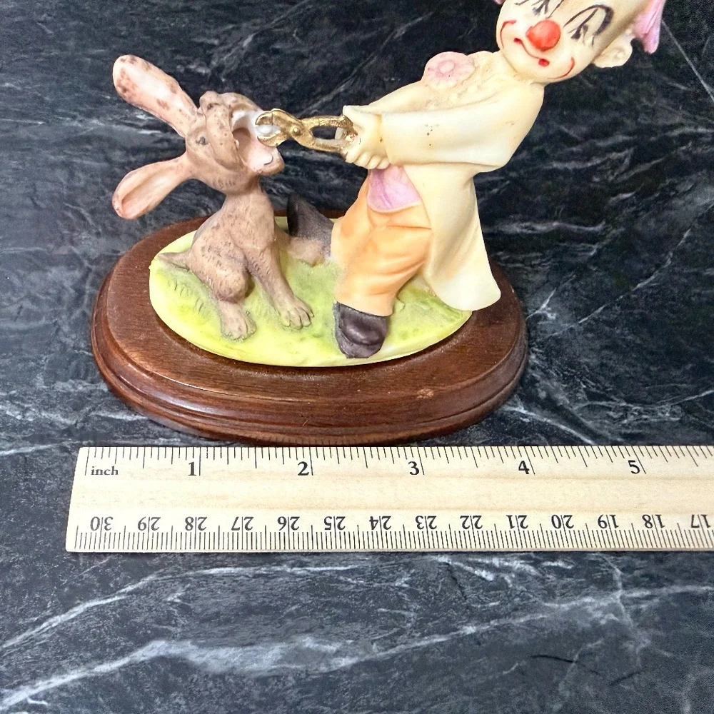 Dentist Clown Pulling Rabbits Tooth Figurine